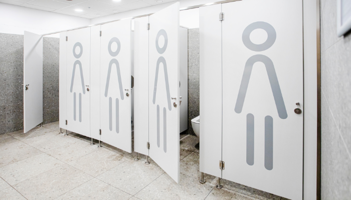 Restroom stall layout for proper menstrual hygiene disposal
